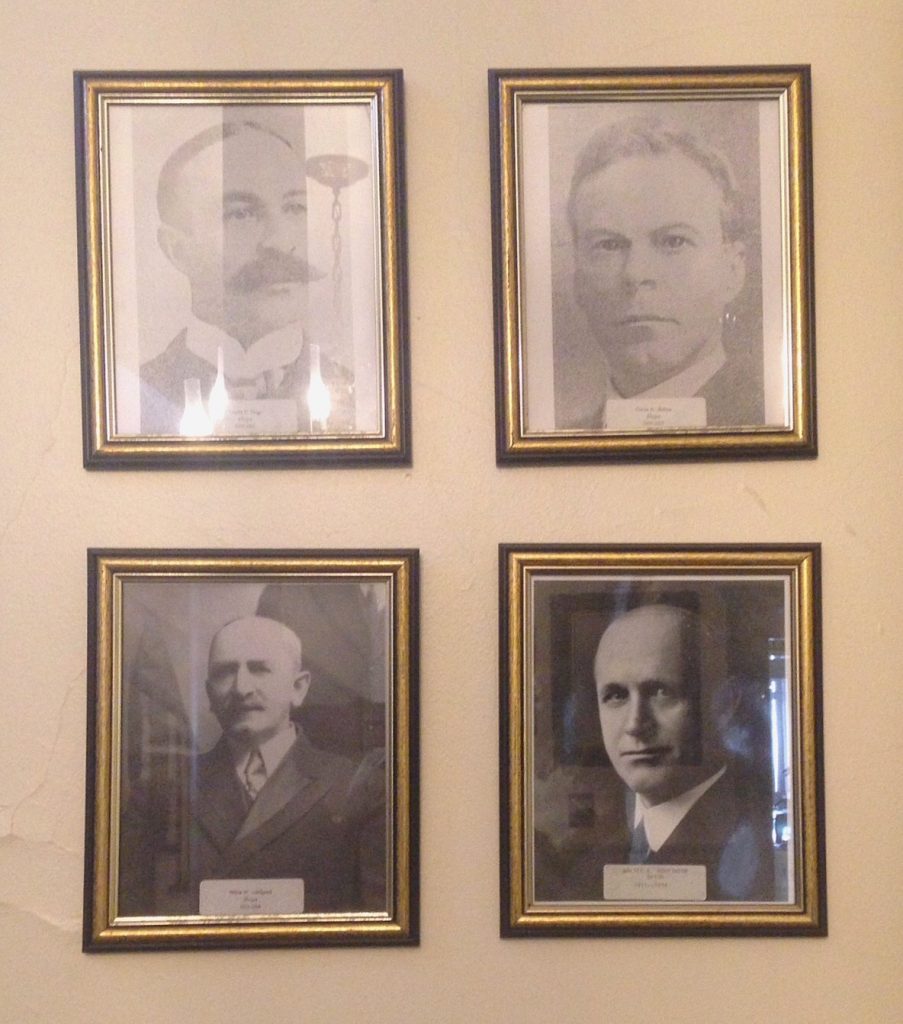 Portraits of four mayors of Newburyport, Walter B. Hopkinson is the portrait on the lower right hand side.